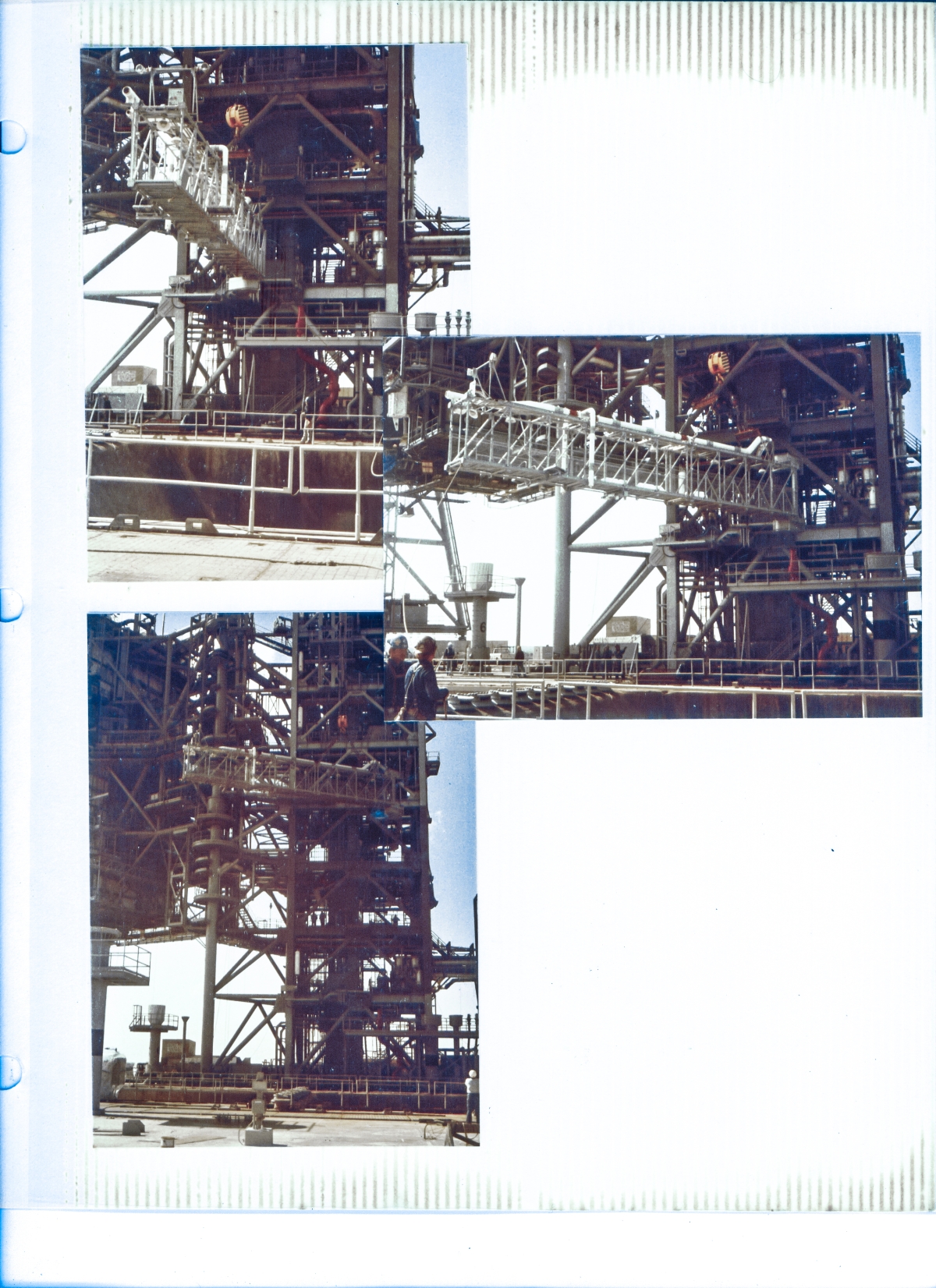 Union Ironworkers from Local 808, working for Ivey Steel at Space Shuttle Launch Complex 39-B, Kennedy Space Center, Florida, rotate the Gox Arm Truss around to its final orientation as it gets lifted by the Hammerhead Crane to the top of the Fixed Service Structure.